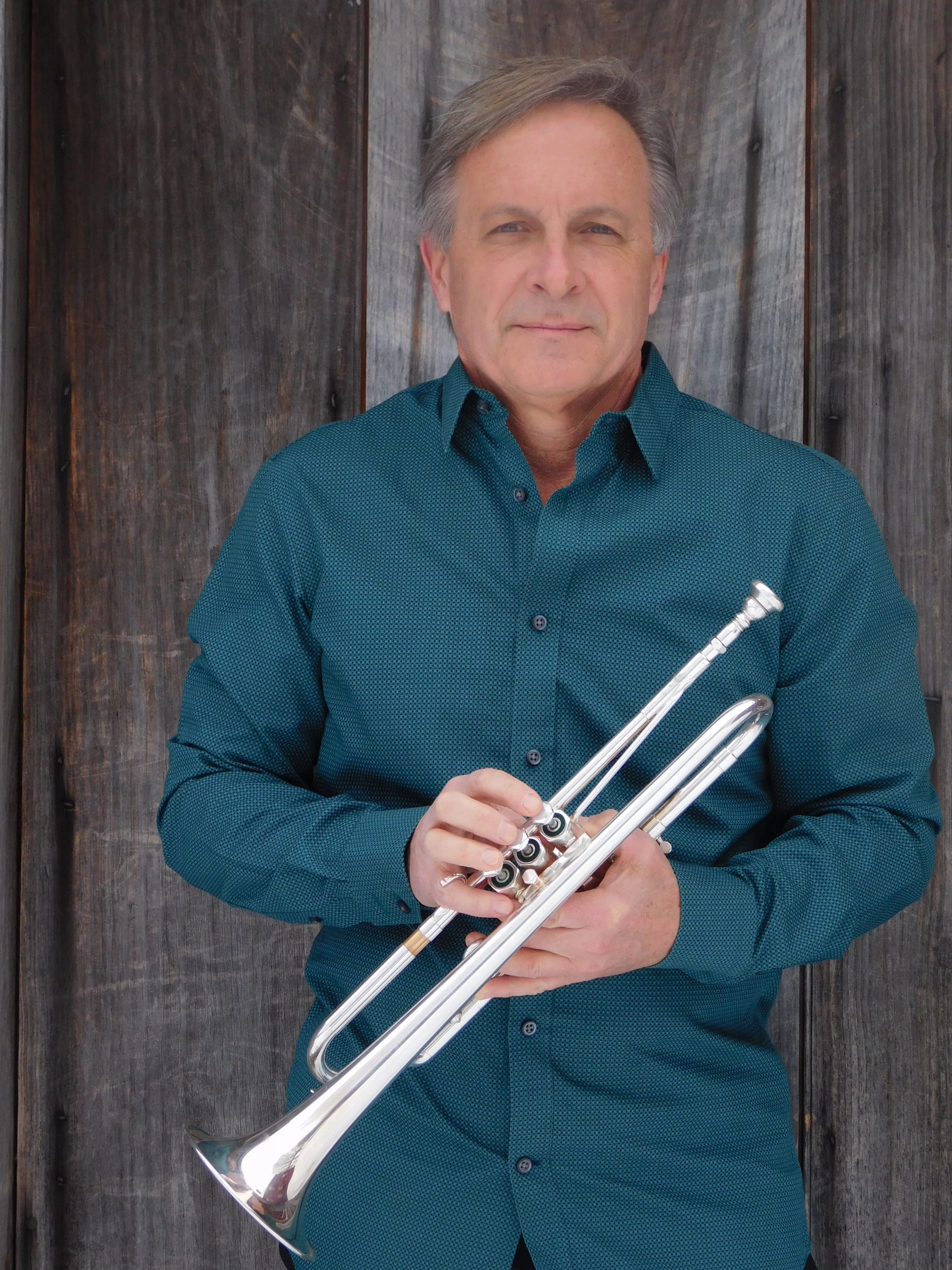 Rene Bernard holding trumpet